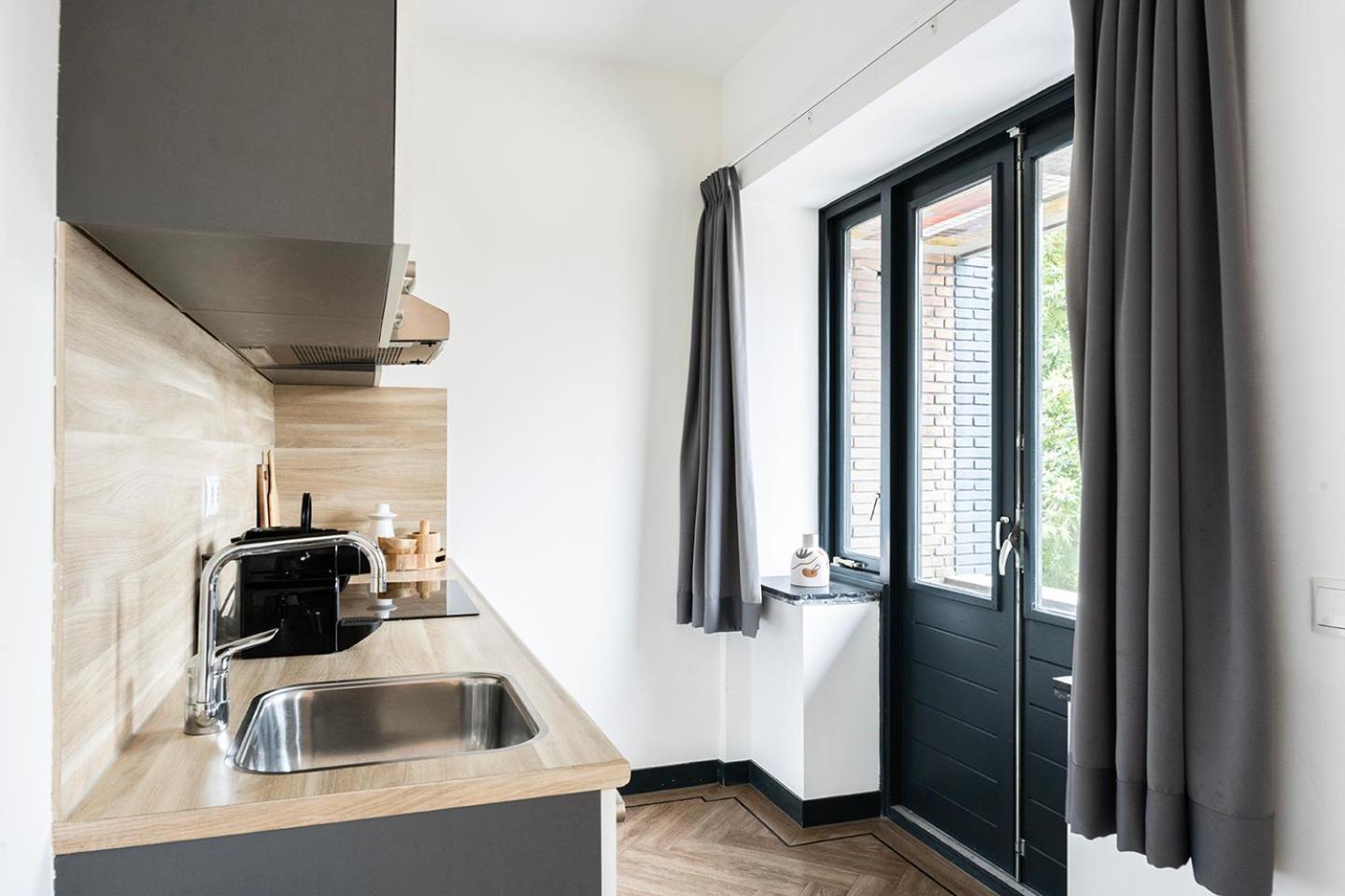 Modern Studio In Kitchen And Bathroom